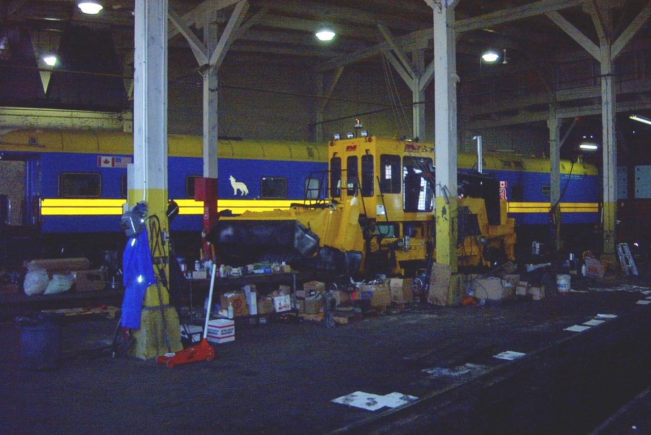 Business car HBRY 800576 Canadian Sunrise (ex-Grand Canyon 2093, exx-CN 22, exxx-CN 90, exxxx-CN 100 Bonaventure) Class PV-79-E Business Car, NSC built in 1959 sits in the Carlton Trail Railway (OmniTRAX) roundhouse in Prince Albert, SK May 29, 2002. 
I was in Prince Albert with a new Nordco ballast regulator/snow fighter for the CTR as seen in the stall next to the Business Car, and got so wrapped up in my work that I failed to get a better angle shot of the car or ask for a tour of the interior. :-( 
In my two trips from Winnipeg to Churchill and points in between in the past two years, I have yet to spot this car anywhere on the HBR line. News on its whereabouts would be appreciated from anyone. :-) 
The roundhouse still stands in Prince Albert.