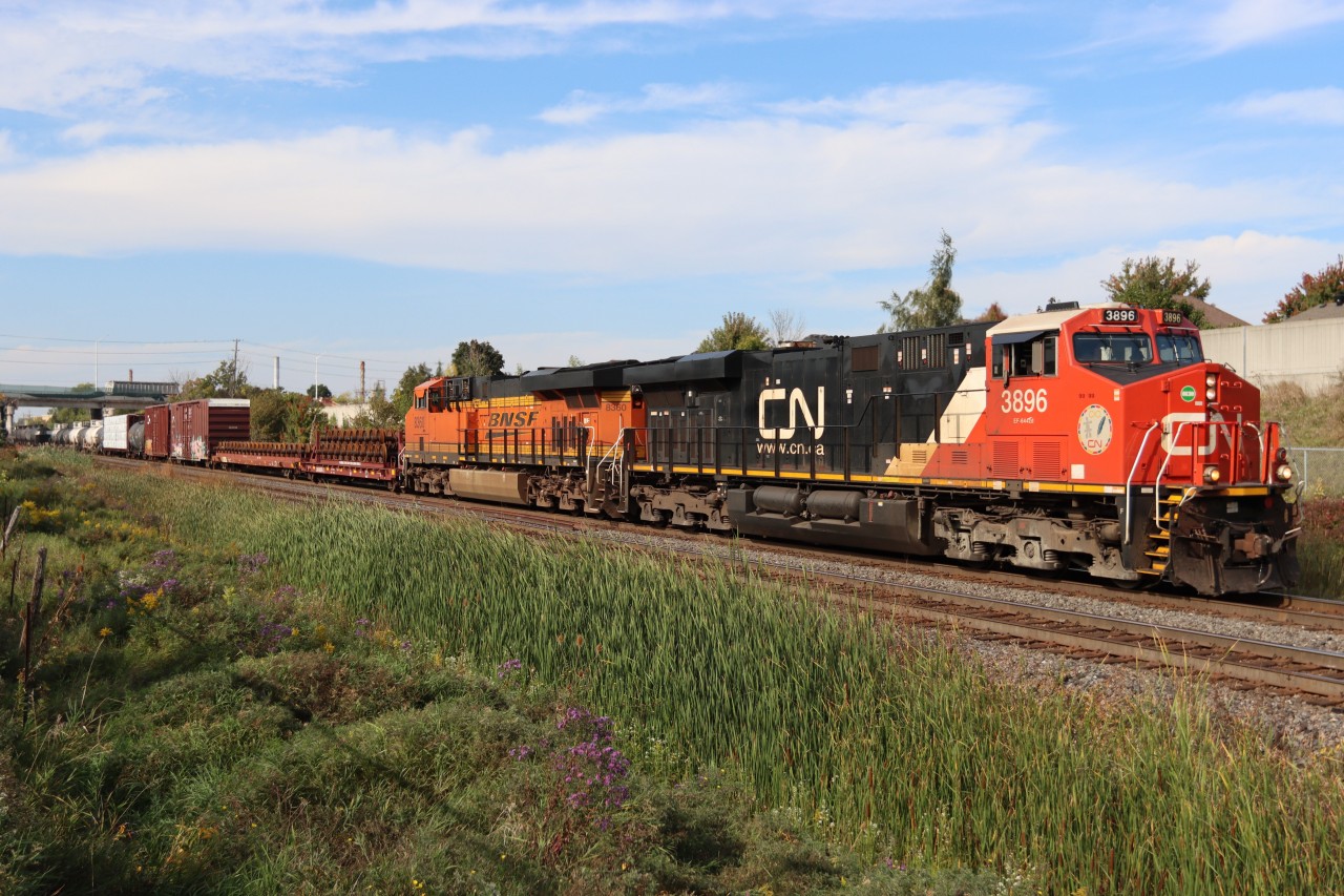 M397 with CN 3896 and BNSF 8360 is restricted to the south track between Tansley and Mile 44.0 Halton Sub. as demolition work on the former Dundas St. overpass continues adjacent to the north track.