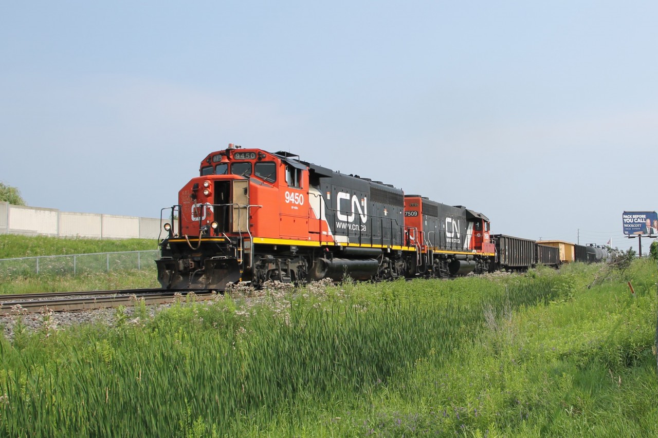 On what is a hot and humid July day, CN 9450 (aka HMS Slow II) leads L551 up the grade toward Tansley with the AC on high.