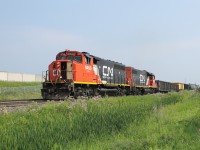 On what is a hot and humid July day, CN 9450 (aka HMS Slow II) leads L551 up the grade toward Tansley with the AC on high.  