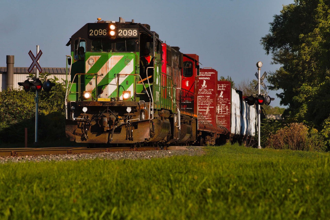 I may have been late to the show for this green bean nestled in Ontario, but it's still running out of Brantford and has thus far survived enough rounds of power swaps that it begs the question of when CN will do its overdue 90-day inspection. Its partner is now 4791, and this particular run on Labor Day was unusually late, departing Brantford after 9am, had a lengthy lunch break in Hagersville, and did almost 2 hours of work at CGC. They only got into Caledonia on their northbound leg after 4:30 pm, and the crew being over 10 hours on the job, could often result in a tie-down for safekeeping. Fortunately, L581 relieved the train and would take on the responsibility of bringing L580's train back to Brantford. The low-level lighting here perfectly highlights how late they were as they began entering the outskirts of Brantford in the neighborhood of Cainsville at around 6.