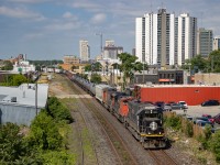 July 7, 2022 - Illinois Central SD70, built in 1992, leads CN 396 eastbound through London, Ontario.  I have only ever seen two SD70s lead, this being one of them.  The old searchlight signals still standing throughout London have always made for interesting additional subject matter.  The IC 'Deathstar' paint scheme has always stood out to me as being especially sharp.  A great example of being simple, but effective.