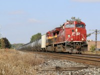 CP 528 with a clean CP / KCS combo heads eastbound at Meadowvale past the disconnect bad order track connection. The old Meadowvale water tower can be seen in the background. Several years ago it’s top was removed and it is now a cell tower. 
