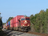 A southbound intermodal has just crossed the trestle over Willow Creek and is about to cross Highway 26. Arnold Mooney posted a shot of the trestle in 1976 with far fewer trees. https://tinyurl.com/ycd7b3py