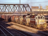 CP train 955, running Agincourt - Parkdale - Sudbury - Winnipeg - Vancouver, passes beneath Bathurst street into the evening sun.<br><br><i>Scan and editing by Jacob Patterson.</i>