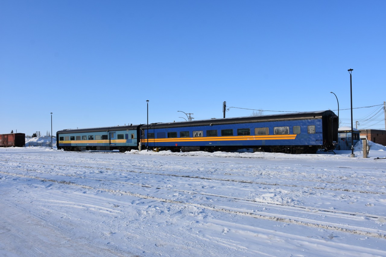 Only two of the four ex-VIA, exx-CN passenger cars were required on yesterday's KRC 291 Pukatawagan Mixed so KRC 3248 & KRC 5648 remain on VIA Storage Track PZ71 at the south end of the station on this wonderfully clear but cold March 17, 2023 morning in The Pas, MB.