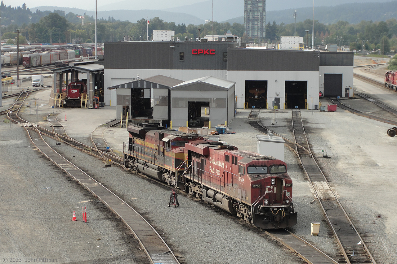 This pair of locomotives east of Port Coquitlam diesel shop match the new four-letter railway company id.
CP 8763 is a GE ES44AC, while KCSM 4092 is an SD70ACe assembled at Bombardier-Concarril in Sahagun Mexico.  
Seems like all KCS units I saw here on my 2 visits, 2 weeks apart, were KCS de Mexico. 
The sidewalk on the west side of the Coast Meridian overpass provides this safe public viewpoint. 
Drawback is the bridge's full-height end-to-end horizontal/vertical rigid steel mesh - the just-under 2 inch square holes are too small for many camera lenses, especially when angling downward, left or right.