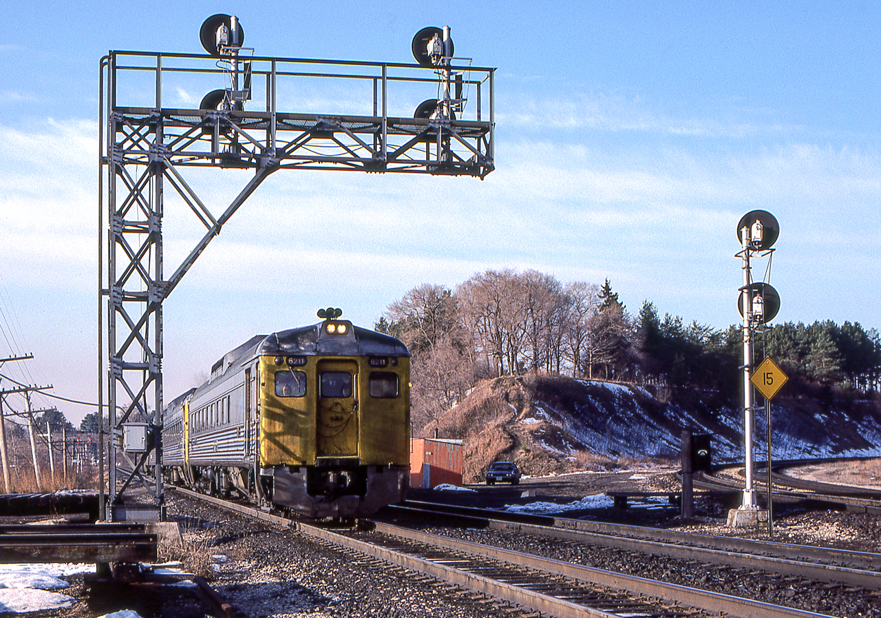 VIA 6211 is bound for Toronto as she leaves Bayview Junction, Ontario on March 27, 1984.