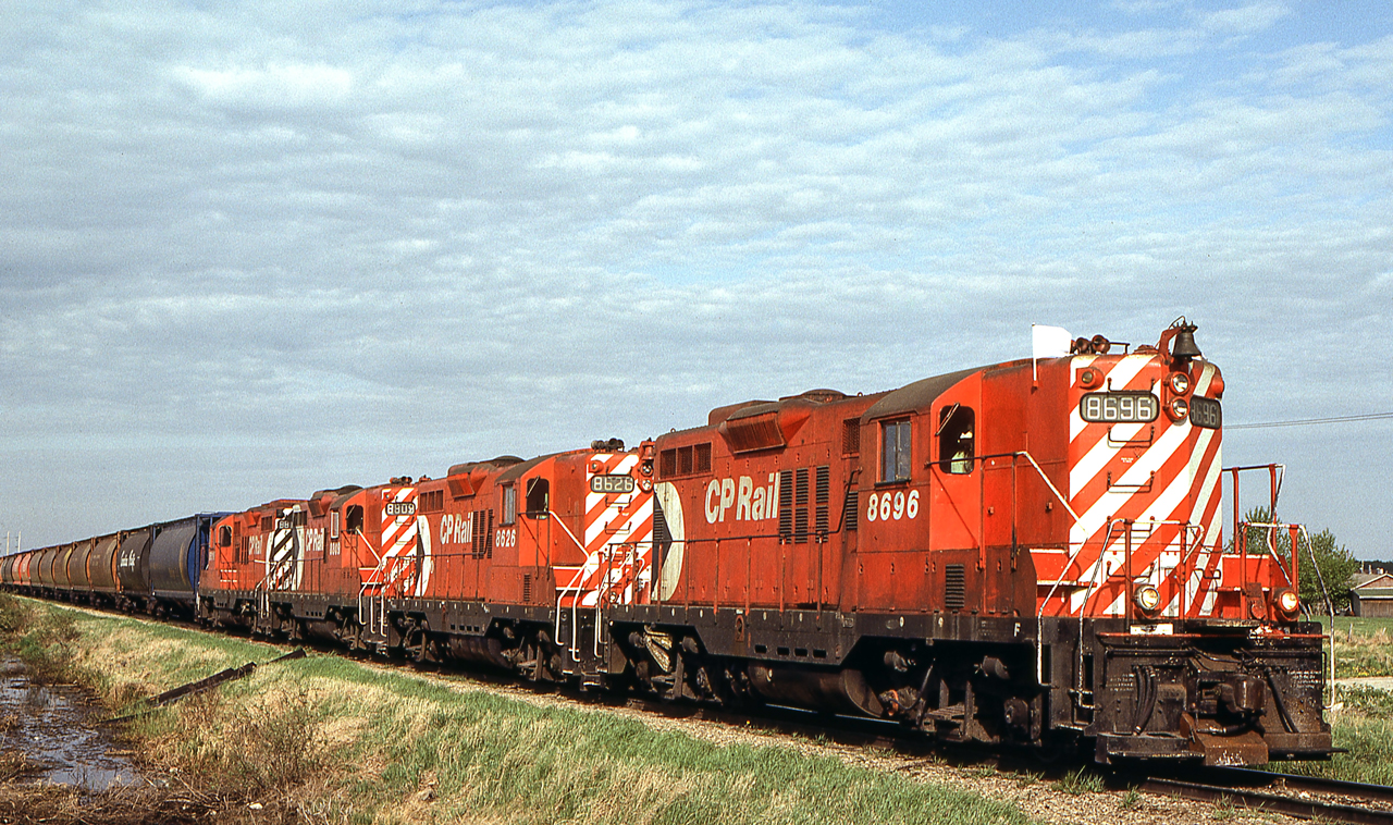 Peter Jobe photographed CP 8696, 8626, 8809, and 8816 in Wetaskiwin, Alberta on May 26, 1983.