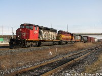 A lashup like this today would quickly bring many trackside, but in 2006 these slipped through all the time as a regular occurrence. An unknown mid-morning CN 300-series westbound rolls through Bramalea GO Station with three SD40's in charge: CN SD40-2W 5248, Wisconsin Central SD40-2 6002 (ex-Algoma Central), and WC (ex-GCFX) SD40-3 6916. Not bad for a catch while waiting for the next GO train to Toronto. All three are off the roster today, victims of CN's late 2000's SD40 purge.