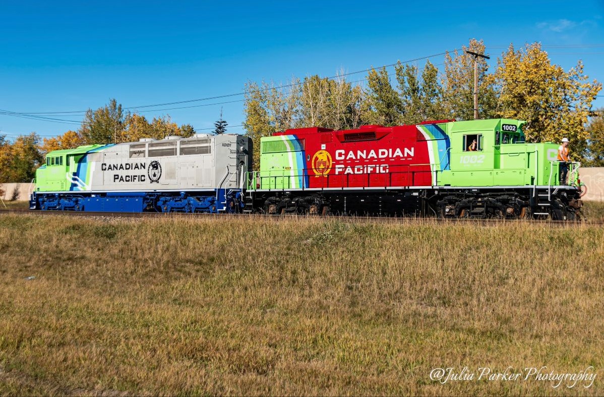CP Hydrogen Fuel test units 1001-1002 just happened to be spotted perfectly as I was driving by.  Within a couple of minutes they had disappeared back into Ogden Yard.