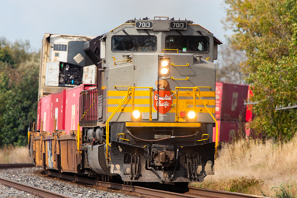 CPKC 112 rounds the curve as it approaches Lovekin East on the Belleville Subdivision.  A somewhat rare sight to have an SD-70ACU leading, and even rarer for it to be one of these beauties!