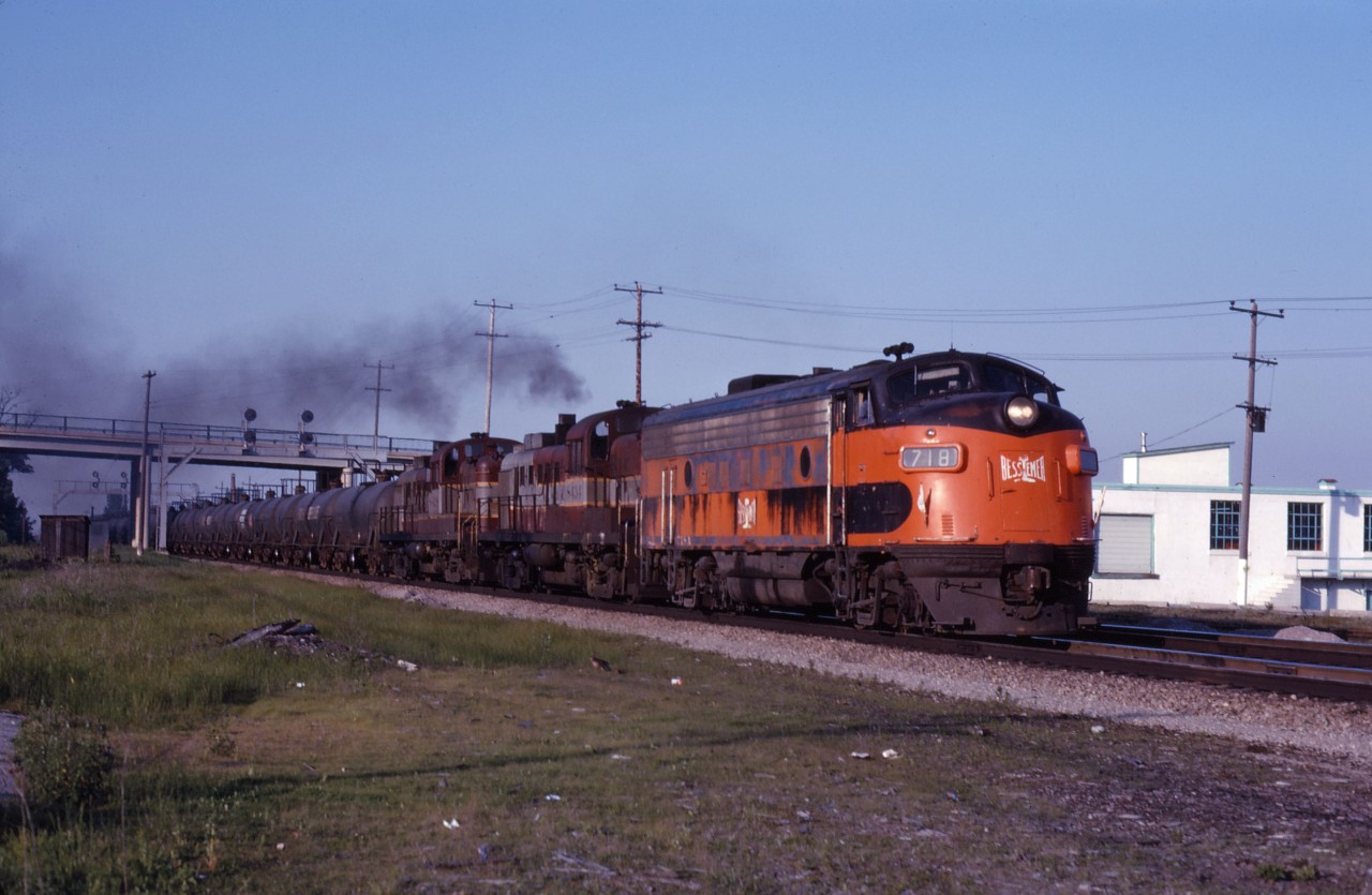 Bessemer & Lake Erie F-units were common leased power on both CP and CN in the 1960s. Here we have B&LE F7A 718 leading a CP westbound over the Oakville sub with RS-3s 8434 and 8428 on a beautiful summer's evening in 1969. (July 1969 processing date.)