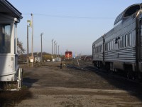 <b> CN Margo, Assiniboine & Togo </b> <br>
Three CN subdivisions converge here at Canora, SK. <br>
CN 3244 rests on the loco track while VIA 692 The Hudson Bay makes its scheduled stop at Canora, SK Mile 0.0 Assiniboine Sub. on September 30, 2023. <br>
Stainless Steel Budd built passenger cars VIA 8511 Skyline, and VIA 8202 Chateau Bienville sleeper are the last two of five cars and two locomotives on today's VIA 692 headed to Winnipeg, MB.