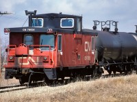 Doing what I considered to be one of the best jobs on the railroad at the time. Riding in the caboose on a summers day.