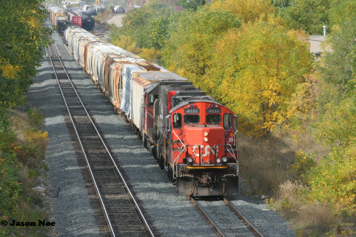 CN L540 with 4131 and 4705 work the east end of the Kitchener yard on the Guelph Subdivision. The crew was building their train for Guelph after a morning run down the Huron Park Spur.