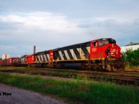 In fading late summer light, CN 421 has just arrived at the Kitchener yard with a short set-off after taking the siding for VIA Rail #88. The consist included; HR616 2102, SD40 5030 and GP9RM 4107. At the time, this was one of the first HR616’s that I ever photographed leading a train. 