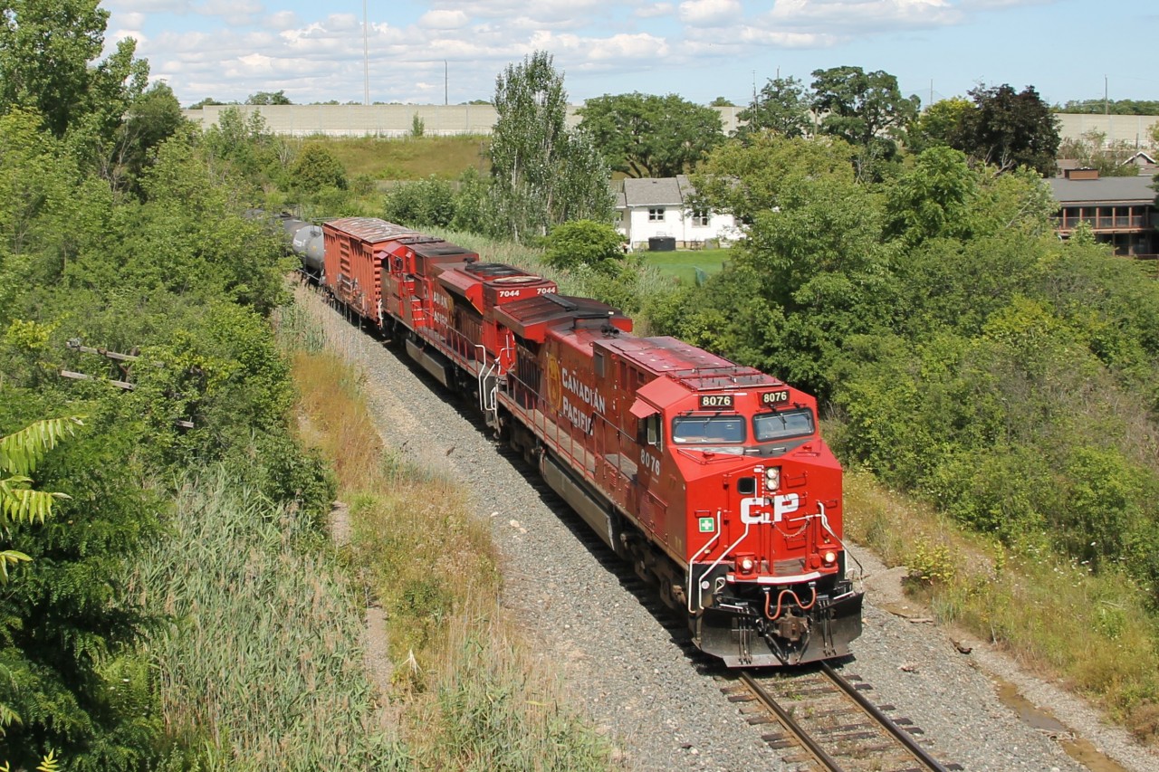 Southbound CPKC with CP 8076 and CP 7044 is seven mile into the "Mountain Grade" territory between Mile 69 and Mile 60 on the Hamilton Sub.. Specific train handling procedures are contained in the Hamilton Subdivision Timetable Footnotes for southward movements descending Hamilton Mountain.