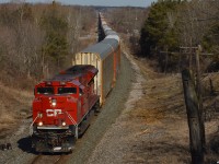 CP 7001 South seen here stretching through Spence pictured in the background, train 100 has just been cleared all the way down to Bolton and is just starting into the grade up to it.