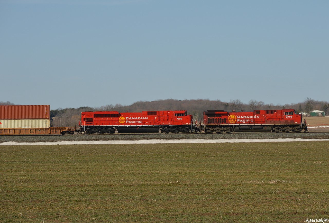 CP 8008 North approaching Alliston with really fresh looking SD70ACU rebuild CP 7058 trailing with matching paint schemes (things you don't say often about CP for 500..) on a beautiful spring day.