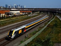 One of VIA Rail's more recently delivered Siemens trainset is on VIA 35 as it passes the skyline of downtown Montreal.