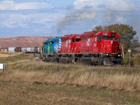 Big Sky Rail train 562 grinds upgrade towards Saskatoon, Saskatchewan at Mile 4 of CN's Rosetown Sub.  562 today had MGLX 5491, MGLX 5493, MGLX 3143, MGLX 6901.

