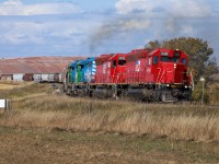 Big Sky Rail train 562 grinds upgrade towards Saskatoon, Saskatchewan at Mile 4 of CN's Rosetown Sub.  562 today had MGLX 5491, MGLX 5493, MGLX 3143, MGLX 6901.

