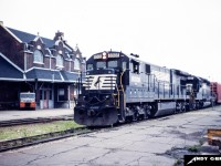 NS C30-7 8008 and SD40-2 6117 have exited the Detroit River Tunnel in Windsor as they bring a train into Canada and by the old Michigan Central station in summer 1987. This station burned down in 1996 due to an arson fire. 
