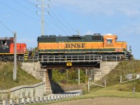 CN L540's first work of the day was to take four empty gondolas down the Huron Park Spur to Triple M Metal on Balzer Rd.  I followed in pursuit, but the sun angle was horrendous for BNSF 2090 leading back north so I decided to return to Kitchener Yard and wait for them to come back.  They threw a wrench in to that plan when they stayed on the south track to go out to the P&H Shantz Station Terminal to reposition cars.  By the time I got out to Shantz Station Rd. they were already done with the repositioning and were ready to head back to Kitchener.  CN 7068 and BNSF 2090 are shown crossing over Shantz Station Rd. heading westbound back to Kitchener Yard. 