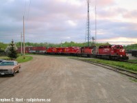 The Junction doesn't look like this anymore, but on a crisp late spring day with the sun setting, CP 167 finally rounds the curve at the Junction with two brand new AC4400's in tow, powered by EMD's finest products ever made (in my opinion, of course).