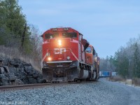 Fall colors are barely hanging on and the sun quickly slipping away as CP train no. 231 highballs through the curves at Roblindale. As is typical with CP's ACu's a headlight is burnt out.