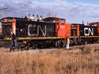 I saw this go by as a cabhop at 9:30 from my house in Redwater. I waited awhile before going to take photos, I knew they would be busy building a train at Egremont. My arrival at 10:30 found them about halfway done to building a train. The cars they came for were stored on the abandoned portion of the Lac La Biche Sub and the Egremont siding was not a large one. So, it was a few cars at a time, runaround them, shove them down the main, cutoff, go get a few more. This photo shows them busy doing what I just mentioned. By 12:30, a train of 65 empty covered hoppers was rolling through Redwater and on the way to Edmonton.