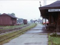 A nice quiet summer day in August of 1972, the Brampton CPR station sits boarded up never to see passenger traffic again. The old freight shed looks like it is still in use but probably for OCS traffic only.