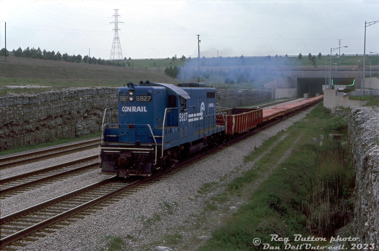 Having changed paint schemes four times but still working on home territory, Conrail GP7 5827 (ex-PC 5827, exx-NYC 5827, originally built as C&O 5729 by GMD London) speeds through the Townline Tunnel on Conrail's Canada Division (former NYC/CASO/MCRR line) near Welland with a short train of CP cars. In two years, CN and CP would purchase the old CASO line from Conrail, and their longtime-assigned Canadian-built Geeps such as 5827 would be retired and sold off or scrapped.

Reg Button photo, Dan Dell'Unto collection slide.
