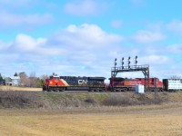 One of those places I like to hang out at in the spring when the sunrise is early and the days are beginning to warm.  Here's a shot of CN #397 westward with CN 3903 and CP 8025. I don't catch lash ups like this very often, and when I do it is a pleasant bonus that helps make my day.