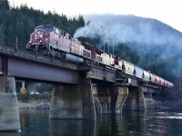 After waiting for a westbound grain to pass, CP 9815 re-starts an eastbound empty potash across the swing bridge at Sicamous.