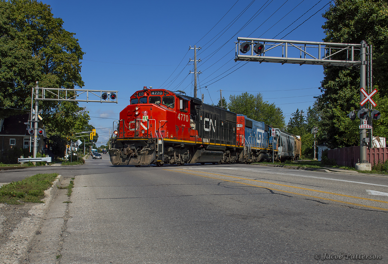 CN L542 has finished its work in Guelph's north end and is seen returning south entering XV Yard.  After some brief work, they will begin their trip to Preston to tie down for the night.