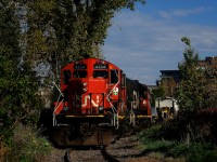 CN 500 has just finished spotting grain cars on two tracks at Ardent Mills. Soon the crew will close the gate and head back to the maine line.