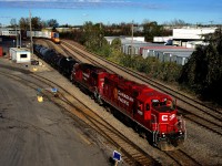 CP 3015 in fairly fresh beaver paint leads G95 as it leaves Lachine IMS Yard for St-Luc Yard with CP 3099 trailing.