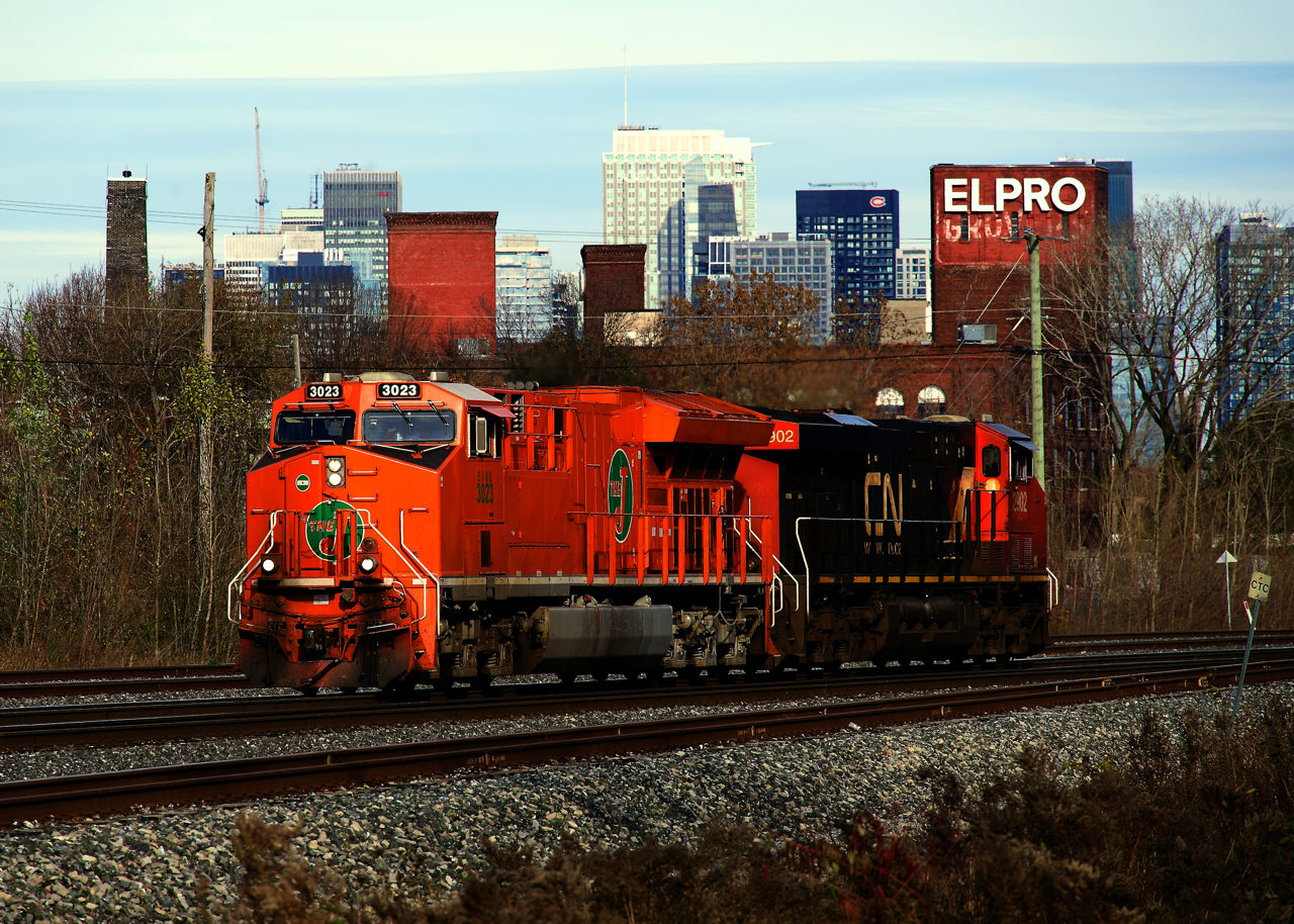 The EJE heritage unit is leading as CN 100's power returns to Taschereau Yard from the Port of Montreal.