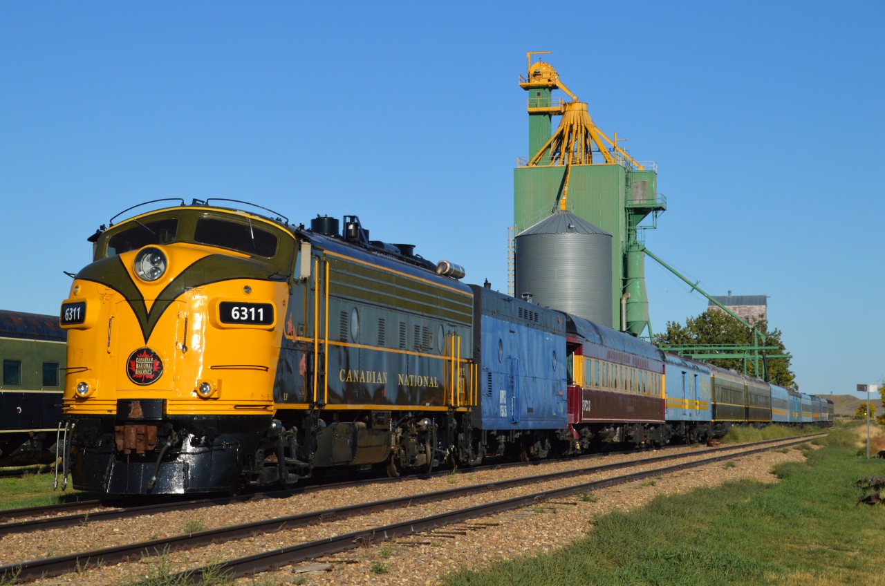 Due to popular requests...well, actually just one viewer...:o)....here is a closer view of one track of the collection in Eastend.  One can see RPCX 6311, steam jenny 15475, RPCX #3 (former CP?) baggage 9653, two coaches in old CN colours, a VIA, a baggage car 9646 (still lettered Bluewater NRHS), coach 9654 and what looks like a combine, a club galley and coach car (in old CN colour) at the end.  Obviously I should have done a lot more wandering but rather relied on shots from afar that unfortunately were not sharp enough to pick up some of the numbers. Quite the Eastend listing in the CTG 2023 and I wouldn't be surprised if more cars have been added since the book was published. The CTG states RPCX is reporting marks of Railroad Passenger Car Numbering Bureau, Inc.