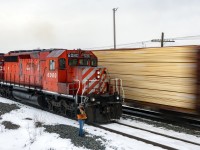 KCS 4120 shoves on the tailend of CPKC 309 as the climb upgrade through Keppel, Saskatchewan