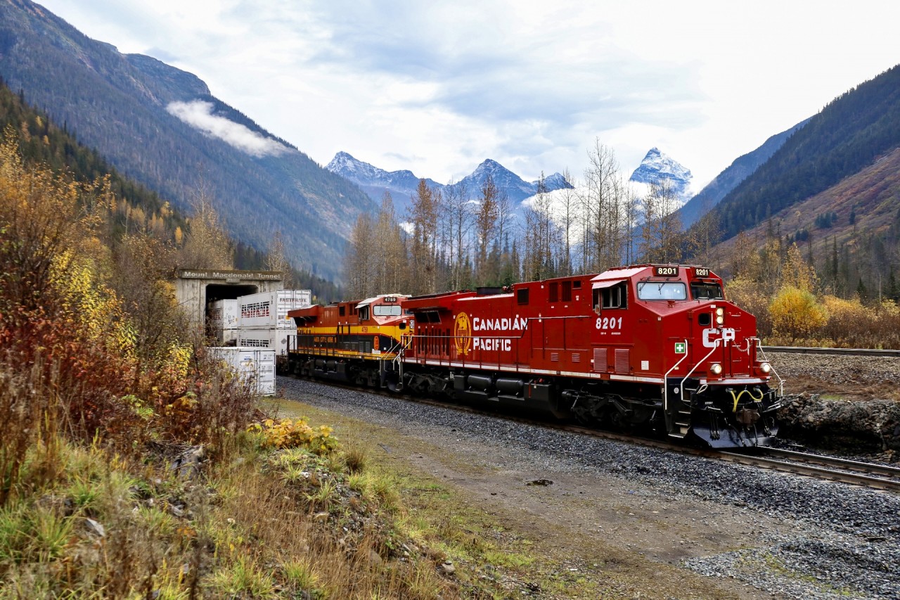 After hearing the train working upgrade for over 20 minutes, CPKC 101-13 blasts out of the 9.11 Mile long Mount Macdonald Tunnel after conquering Rogers Pass.