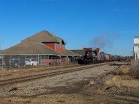 CP 2816 rolls past the old depot at Wetaskiwin, Alberta 