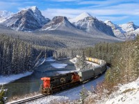 CN 3852 shoves CPKC 301 through Morant’s Curve, as they work upgrade toward the continental divide. 