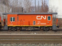 CN 76665, a transfer van now assigned to the MOW department in Symington Yard, sits in Edmonton Alberta coupled to a pair of Dash 8's