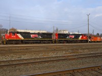 CN 2112, CN 2107 and CN Transfer Van (now in MOW Service) CN 76665 idle outside the Walker Yard Diesel Shop.