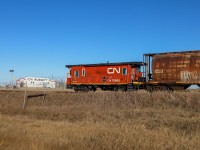 Anything is possible in 2023!  CN 76665 brings up the tailend of CN A 40251 28, which is enroute to Saskatoon for a Christmas event.