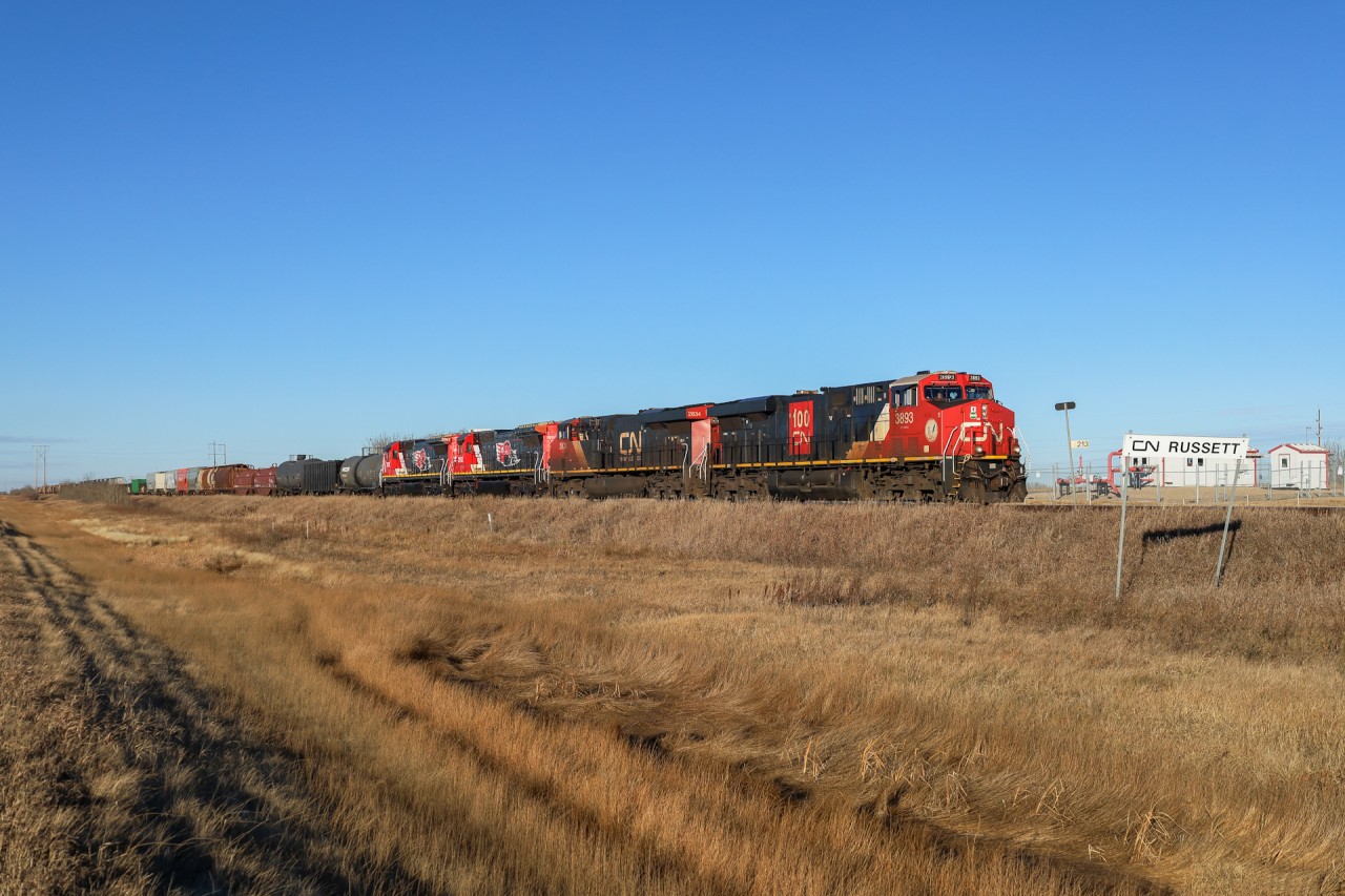 A 40251 28 rolls through Russett with CN 3893, CN 2834, CN 2112, CN 2107.