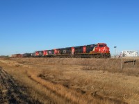 A 40251 28 rolls through Russett with CN 3893, CN 2834, CN 2112, CN 2107.